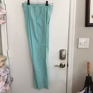 Beautiful turquoise pants front seam and pocke